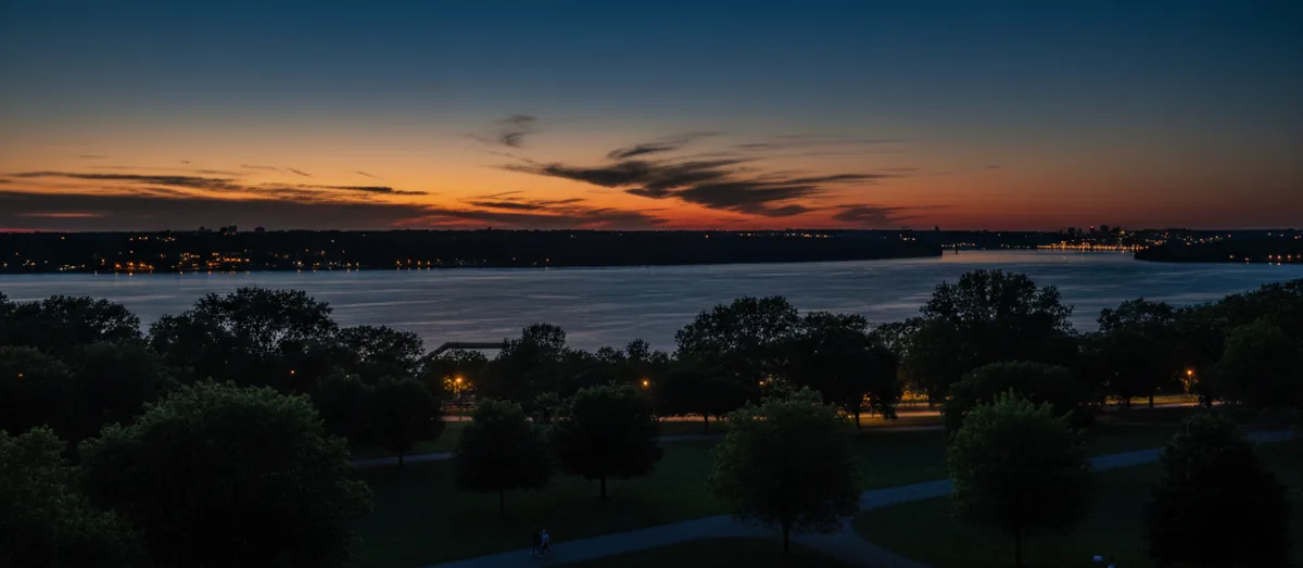 Golden hour sunset over the Hudson River as seen from a scenic park in Westchester County.